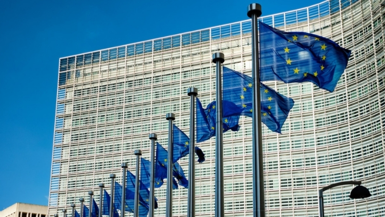 European Union flags flying outside the European Commission headquarters in Brussels